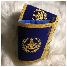 Load image into Gallery viewer, Blue Past Master (Event) Masonic Cuffs. Blue velvet. Gold embroidered masonic symbol. Gold braided fringe trims the cuffs shown closed.

