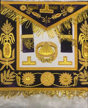 Load image into Gallery viewer, Deputy Grand Master (Event) Masonic Apron. Purple velvet. Gold bullion and braided edges and fringe. Embroidered masonic symbol. Design outlined in 100% Swarovski Crystals.
