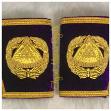 Load image into Gallery viewer, Deputy Grand Master Cuffs. Purple velvet. Gold bullion and braided edges and fringe. Embroidered masonic symbol. Design outlined in 100% Swarovski Crystals.
