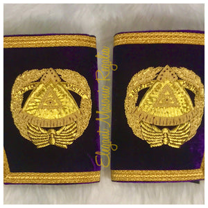 Deputy Grand Master Cuffs. Purple velvet. Gold bullion and braided edges and fringe. Embroidered masonic symbol. Design outlined in 100% Swarovski Crystals.