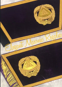 Deputy Grand Master Cuffs. Purple velvet. Gold embroidered masonic symbol. Gold braided fringe trims the cuffs shown open.
