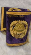 Load image into Gallery viewer, Deputy Grand Master Cuffs. Purple velvet. Gold embroidered masonic symbol. Gold braided fringe trims the cuffs shown closed.
