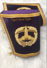 Load image into Gallery viewer, Grand Senior Warden Masonic Cuffs. Purple velvet. Gold embroidered masonic symbol. Gold braided fringe trims the cuffs shown closed.
