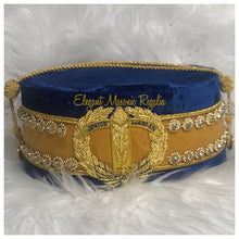 Load image into Gallery viewer, Junior Warden Crown (Blue House). Embroidered masonic symbol. Blue velvet. Rhinestones around circumference of the cap.
